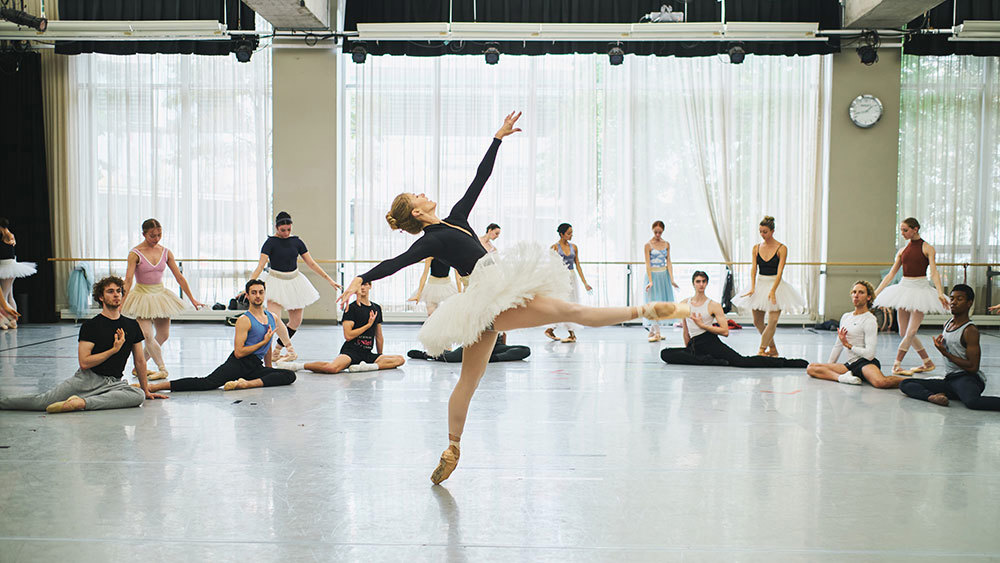 Heather Ogden with Artists of the Ballet. in rehearsal for Suite en Blanc