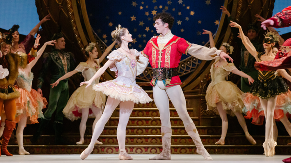 Heather Ogden and Christopher Gerty with Artists of the Ballet in The Nutcracker.